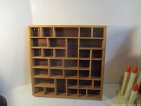 Front view of square cubby shelf showing compartments and overall design