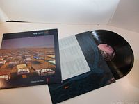Front cover, inner sleeve and vinyl record displayed