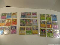 All three binder pages showing full set of Pokémon cards