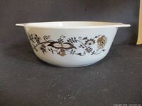 Side view showing brown floral pattern and overall condition