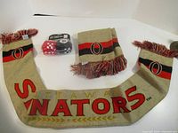 All items laid out: two scarves and packaged fuzzy dice