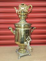 Full front view with chimney cap in place showing spigot and base