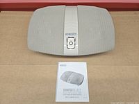 Top view of massager and manual