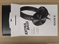 Sleeve removed, inner black box and outer sleeve displayed