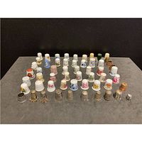 All 58 thimbles arranged on table