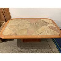 Top view showing teak frame and geometric stone tile surface