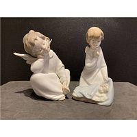 Both Lladro figurines side by side showing overall form