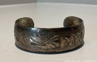 Front view of engraved 800 silver cuff bracelet