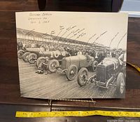 Front view of entire reproduction print on stand with measuring tape for scale