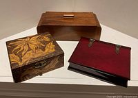 Three wooden boxes grouped