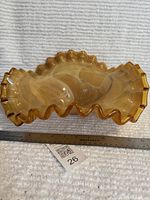 Side profile showing depth and pronounced wave of ruffle edge