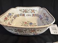 Oblique view of square floral bowl