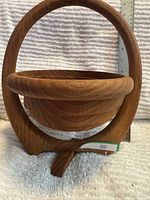 Bowl configuration showing arched handle, spiral bowl and base