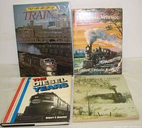 Front covers of all four train books