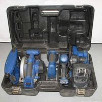 Entire kit in open hard case showing all tools and charger