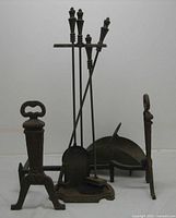 full lot showing andirons, tool set with stand, brass log holder