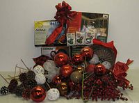 Overall lot showing boxed lights and decorative picks