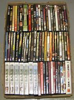 Full view of box showing rows of DVD spines