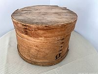 Wooden firkin with lid closed, exterior view