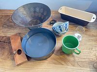 Overview of all visible items on wooden surface