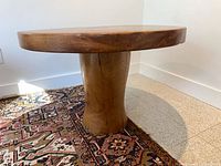 Full view of teak round pedestal table