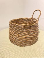 Basket side view showing weave and handle