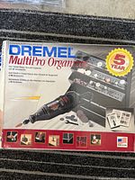 Front of boxed Dremel MultiPro Organizer kit showing tool, organizer and accessories