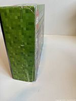 Box right side showing intact shrink wrap