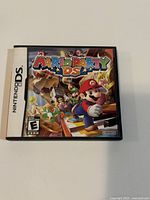 Front view of Mario Party DS case showing cover art
