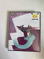 Binder front cover showing Train On design