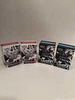 Front view: four booster bundle boxes closed