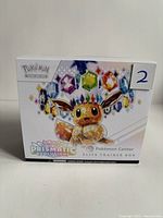 Front of Pokémon Center Prismatic Evolutions Elite Trainer Box showing Eevee artwork and number sticker