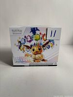 Front of Pokémon Prismatic Evolutions Elite Trainer Box