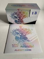 Outer sleeve, inner box and Player’s Guide shown together