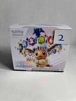 Front of Pokémon Prismatic Evolutions Elite Trainer Box