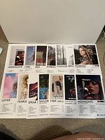 Poster showing 12 album cover prints on cardstock