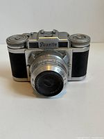 Front view showing Paxette name, lens and body