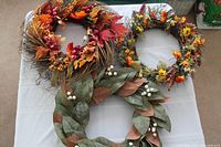 All three wreaths displayed on table