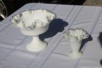 Pedestal bowl and cone vase together