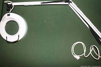 Full view of magnifying lamp with cord and clamp base