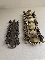 Stacked sets of both drawer pull styles side by side