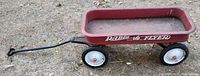 Full side view of red Radio Flyer wagon