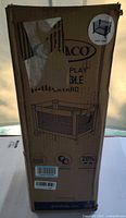Front of boxed Graco Pack 'n Play playard