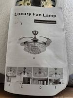 Installation instructions leaflet showing product image and model variations