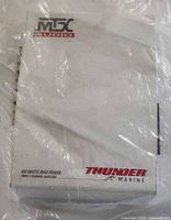 Front view of MTX Audio Thunder Marine TM452 amplifier inside clear plastic wrap