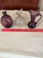 All three glass items side by side with ruler for scale