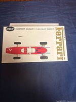 Box lid showing Cox Ferrari graphics