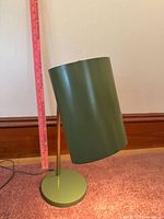 Side view of lamp showing cylindrical shade and ruler for height reference
