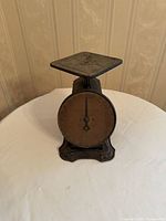 Front three-quarter view of scale showing platform and dial