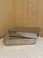 Two stacked rectangular aluminum pans